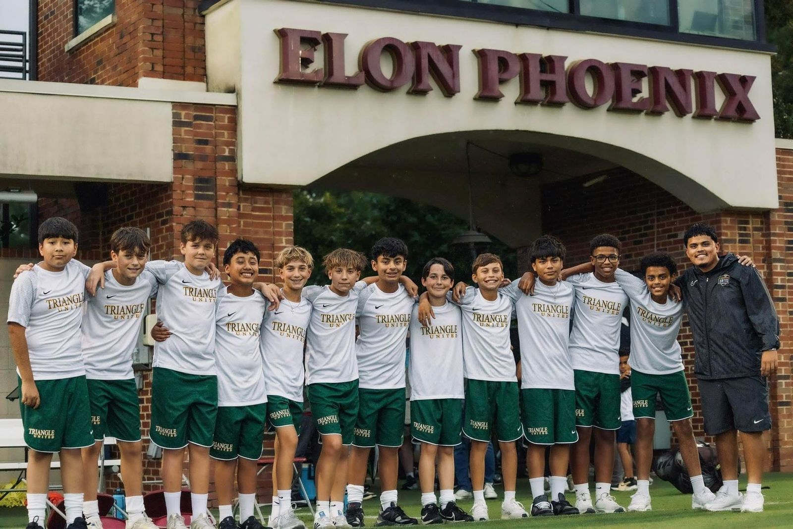 Triangle United boys team together after a road match at Elon University